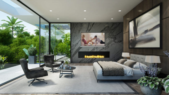 A modern bedroom with glass walls and a fireplace.