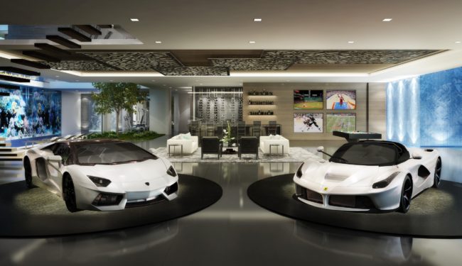 Two white sports cars are on display in a living room.