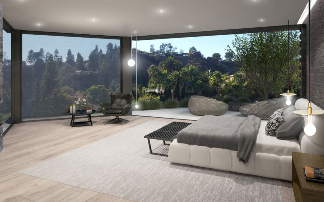 A bedroom with a fireplace and a view of the mountains.