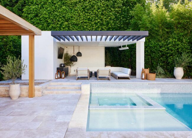 A pool with a blue awning over it